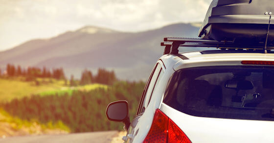 car headed for vacation in the mountains